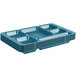 A stack of teal Cambro compartment trays.