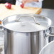 A Vollrath Optio pot with a lid on it.