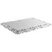 A silver rectangular Vollrath metal tray with a wavy edge.