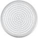 A white circular metal pizza pan with perforations.