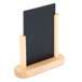 An American Metalcraft black board on a wooden stand.
