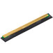 A black and green plastic strip with a gold rectangular brass insert.
