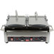 A Cecilware double panini sandwich grill with two flat grill surfaces on a counter.