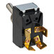 A close up of a black toggle switch with two gold contacts.