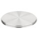 A silver stainless steel circular cover with a circular design.
