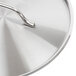 A Vollrath stainless steel pan lid with a silver handle.