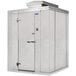 A Norlake white metal walk-in freezer with a door open.