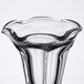 A clear Libbey tulip sundae glass with a wavy edge.