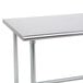 A stainless steel Advance Tabco open base work table.