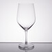 A close-up of a Stolzle clear wine glass.