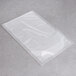 An ARY VacMaster chamber vacuum packaging bag on a grey surface.