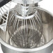 A Globe stainless steel wire whip for a mixer.