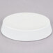 A white oval Hall China baker dish with text on it.