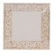 A white square plate with a brown border.