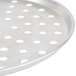 An American Metalcraft aluminum pizza tray with perforations.