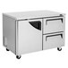 A silver stainless steel Turbo Air undercounter refrigerator with two drawers.