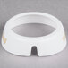 A white circular plastic Tablecraft salad dressing dispenser collar with beige lettering.