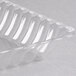 A clear plastic rectangular tray with wavy edges.