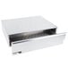 A silver stainless steel drawer with a silver tray on top holding hot dog buns.
