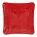 A red square GET Melamine plate with a spiral pattern.