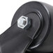A close-up of a True 2 1/2" swivel stem caster with a black wheel.