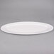 An American Metalcraft white oval melamine boat platter with handles.