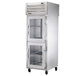 A True Spec Series pass-through refrigerator with glass doors on one side and solid doors on the other.