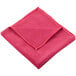 A red Unger SmartColor microfiber cloth folded on a white background.