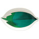 A white melamine leaf shaped plate with green accents.
