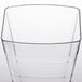 A clear plastic Fineline Wavetrends tumbler with a curved edge.