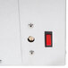 A close up of the APW Wyott RTR-4Di cold well switch, a metal box with a red button.