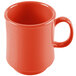 A close-up of a Rio orange GET Diamond Mardi Gras mug with a handle.
