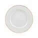 A white porcelain plate with gold trim.