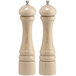 Two wooden Chef Specialties pepper mills with a natural finish.