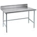 A stainless steel Advance Tabco work table with a long rectangular top and open base.