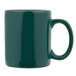 A close-up of a Tuxton Hunter Green china mug with a C-handle.