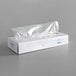 A white box with a clear plastic bag on top of LK Packaging plastic deli and bakery wrap.