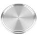 A close-up of a Vollrath stainless steel pot lid with a loop handle.