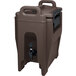 A dark brown plastic Cambro insulated beverage dispenser with a faucet.