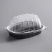 A clear plastic D&W Fine Pack chicken roaster container with a clear lid.