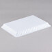 A white rectangular Fineline plastic tray with ruffled edges.