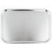 A Vollrath stainless steel rectangular serving tray.