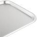 A close-up of a Vollrath stainless steel serving tray.