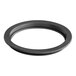 A black round gasket with a white background.