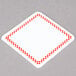 A white square Ketchum Manufacturing deli tag with a red checkered border.