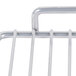 A Delfield left section wire shelf for a refrigerator with a white background.