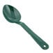 A close-up of a green polycarbonate salad bar spoon with a handle.
