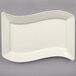 A white rectangular plate with a curved edge.