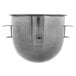 A close-up of a Vollrath stainless steel mixing bowl with handles.