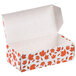 A white 1/2 lb. Leaf Candy Box with orange leaves on it.